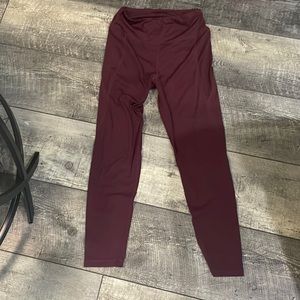 A M burgundy colored leggings in women’s from SHEIN.